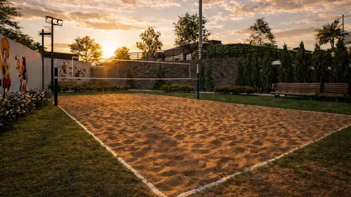 Quadra de beach tennis do condomínio ao pôr do sol
